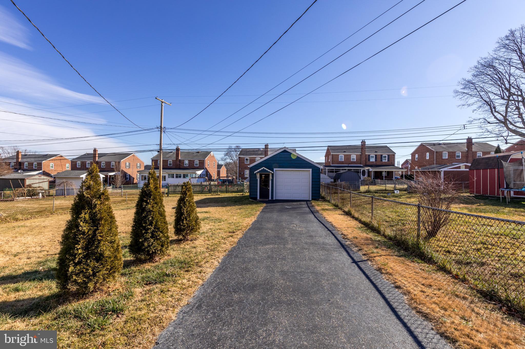 109 Elinor Avenue Nottingham, MD 21236 - Photo 30 of 33 a view of a swimming pool with a chairs