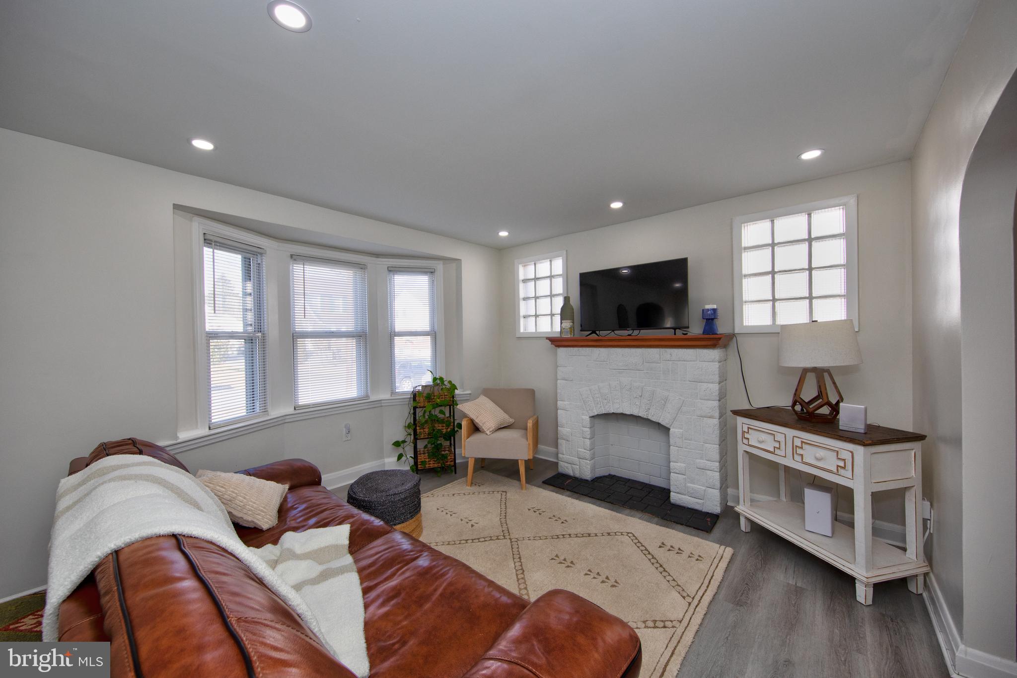109 Elinor Avenue Nottingham, MD 21236 - Photo 3 of 33 a living room with furniture fireplace and window