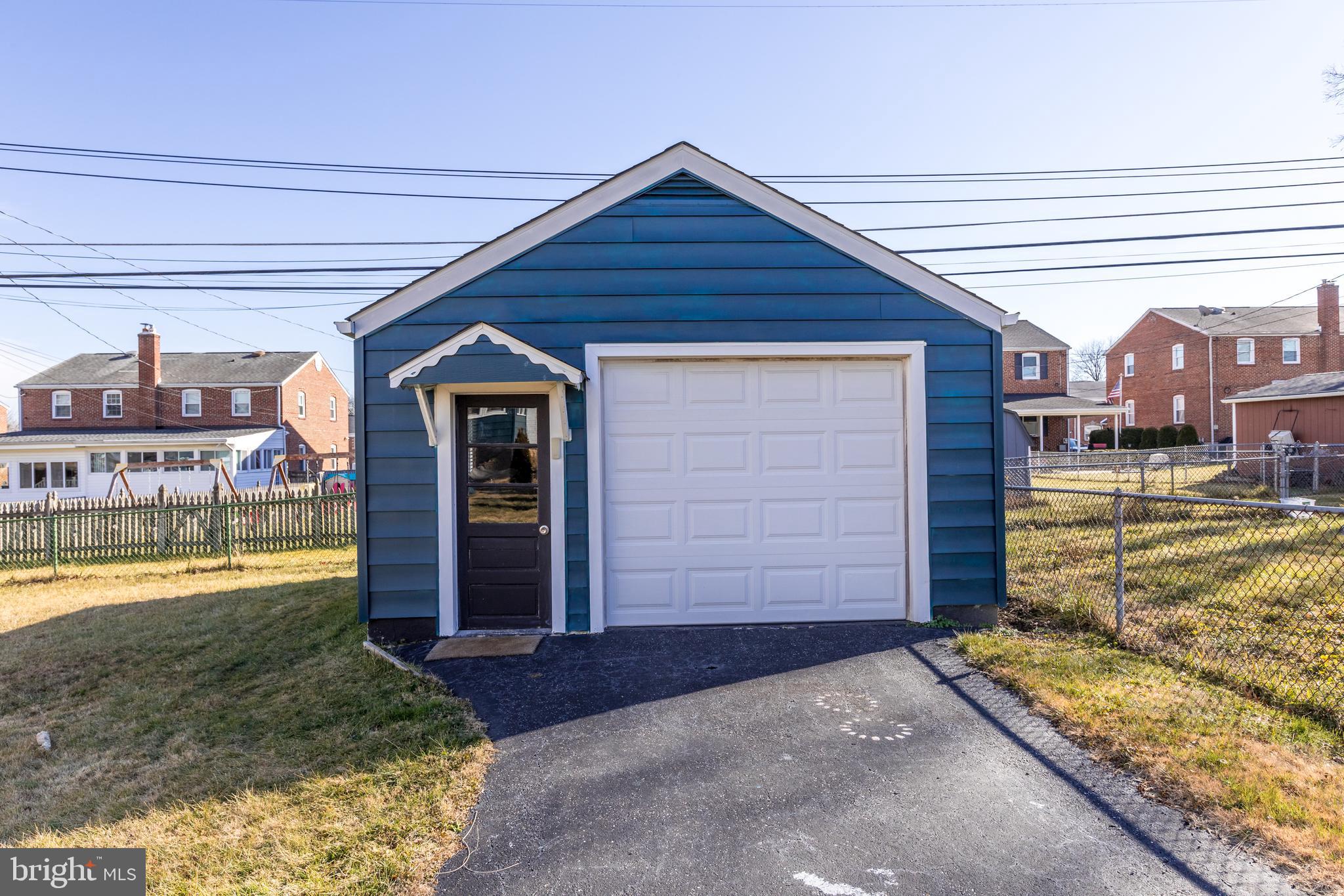 109 Elinor Avenue Nottingham, MD 21236 - Photo 31 of 33 a front view of a house with garden