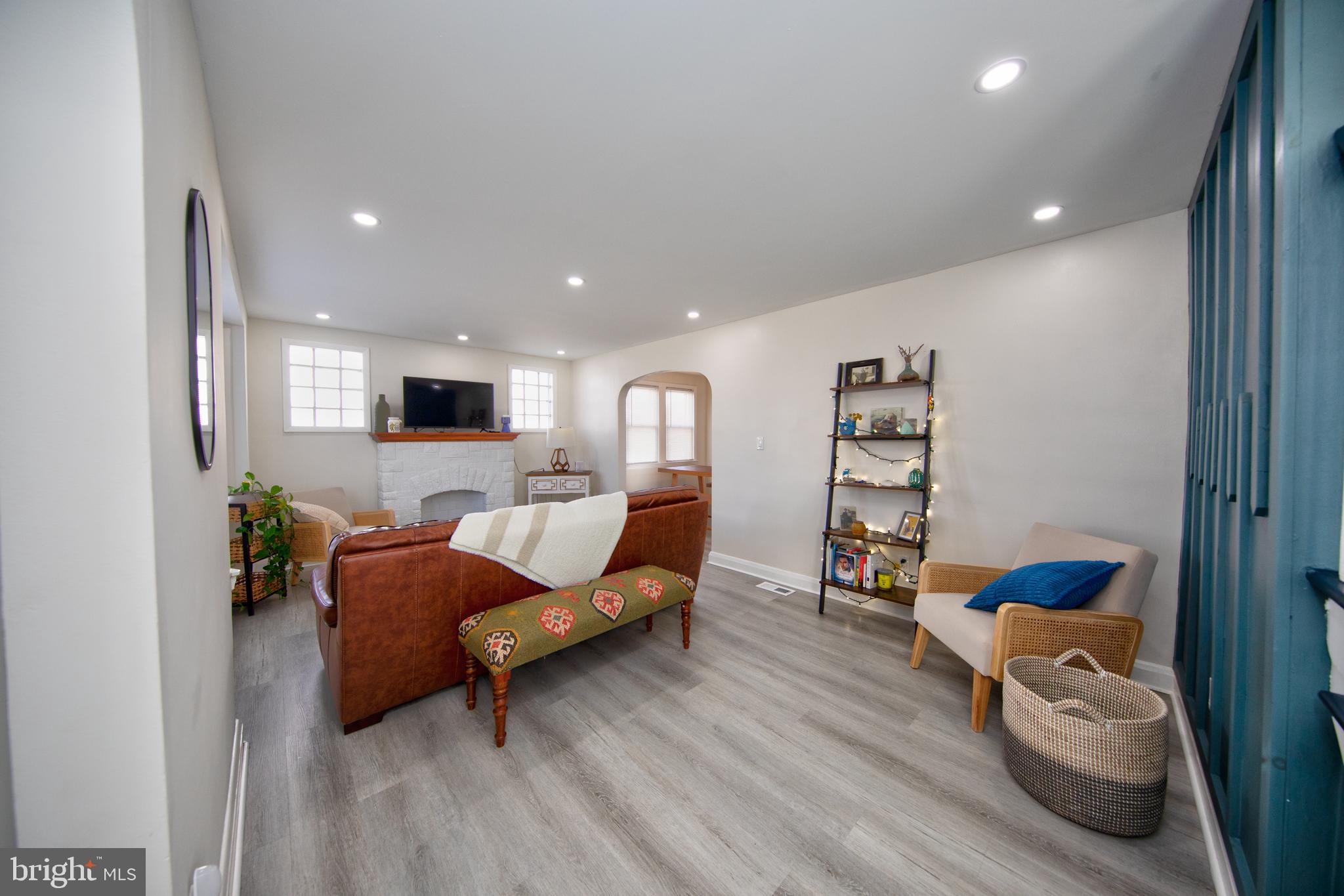 109 Elinor Avenue Nottingham, MD 21236 - Photo 5 of 33 a living room with furniture and a wooden floor