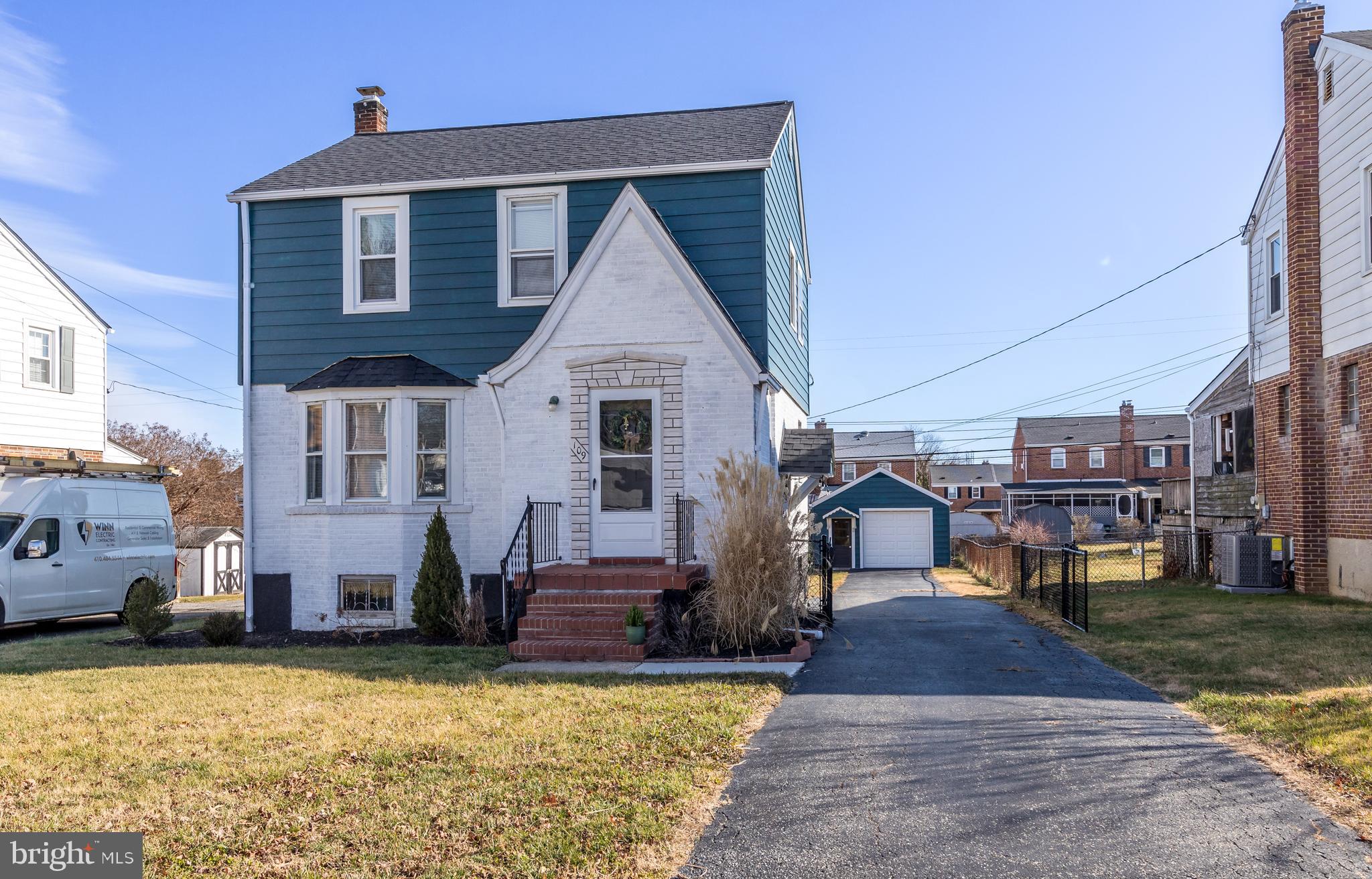 109 Elinor Avenue Nottingham, MD 21236 - Photo 7 of 33 a front view of a house with a yard