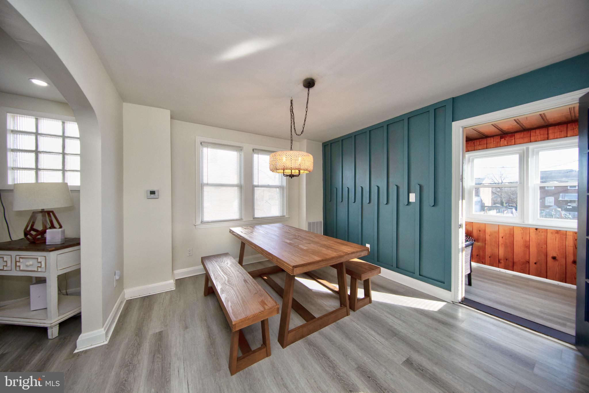 109 Elinor Avenue Nottingham, MD 21236 - Photo 9 of 33 a living room with furniture a window and wooden floor