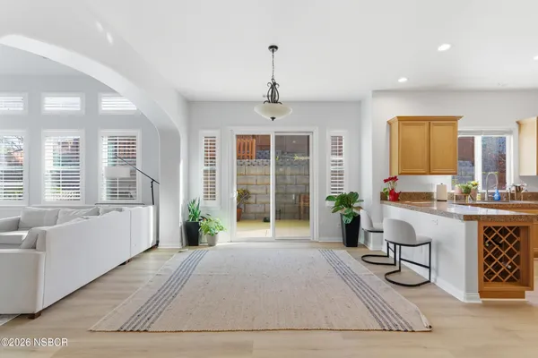 a kitchen with sink cabinets and window