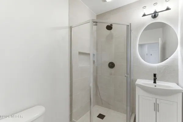 a view of a hallway view with staircase