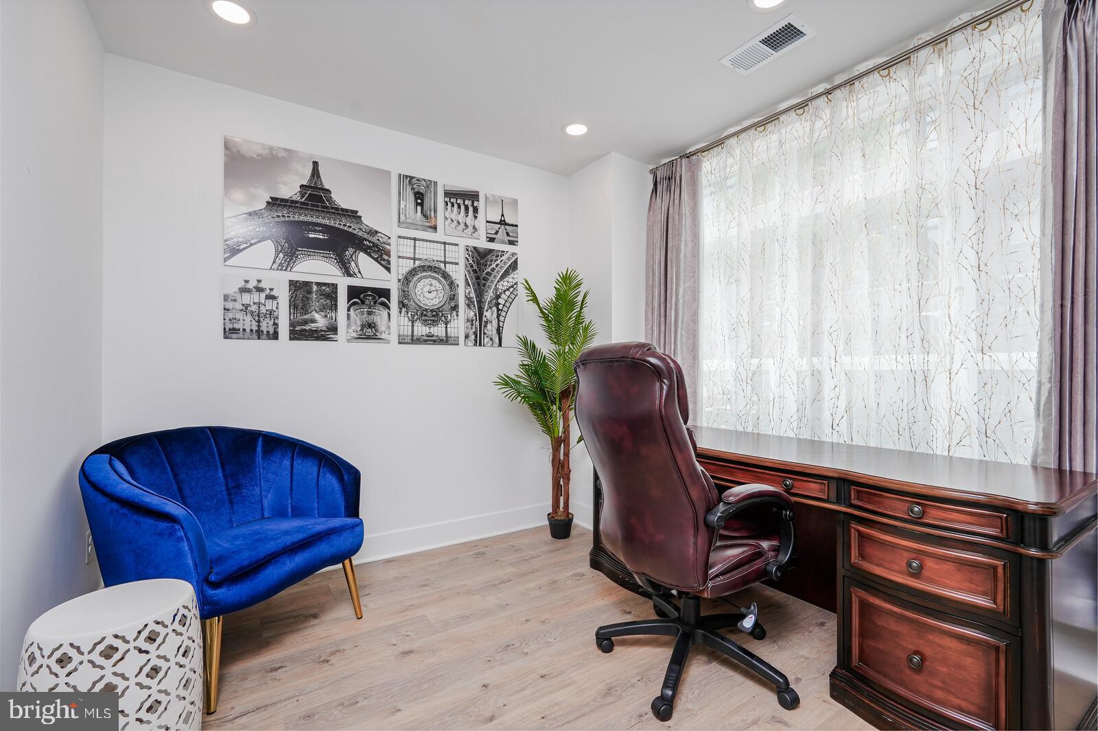 5345 Zenith Overlook Bethesda, MD 20816 - Photo 5 of 53 a living room with furniture and a chair