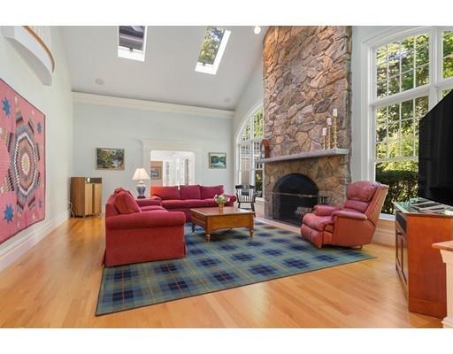 45 Pine Street Weston, MA 02493 - Photo 14 of 27 a living room with furniture wooden floor and a fireplace