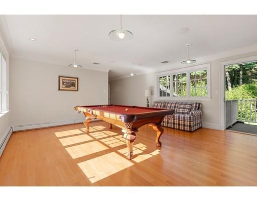 45 Pine Street Weston, MA 02493 - Photo 18 of 27 a living room with furniture and a large window