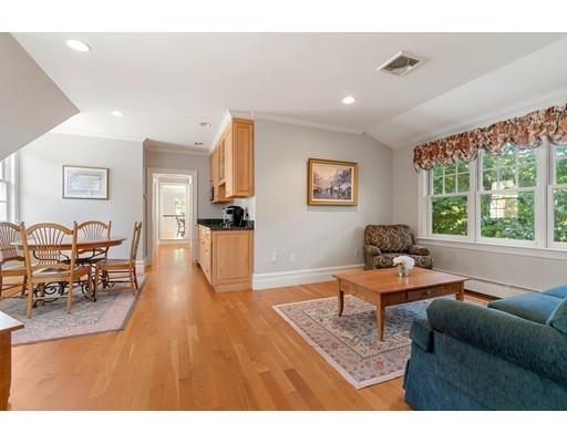 45 Pine Street Weston, MA 02493 - Photo 20 of 27 a living room with furniture and a large window