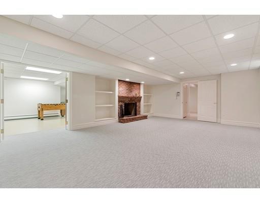 45 Pine Street Weston, MA 02493 - Photo 21 of 27 a view of an empty room with a fireplace