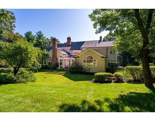 45 Pine Street Weston, MA 02493 - Photo 24 of 27 a front view of house with yard and green space