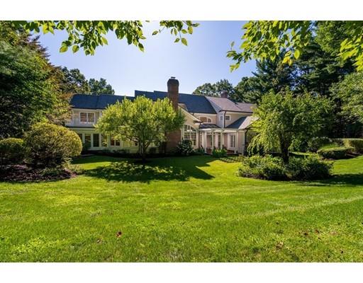 45 Pine Street Weston, MA 02493 - Photo 25 of 27 a front view of a house with a yard
