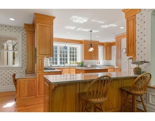 45 Pine Street Weston, MA 02493 - Photo 10 of 27 a view of a kitchen with kitchen island granite countertop a living room