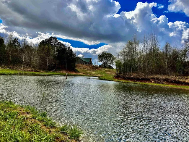a view of a fountain in front of a house
