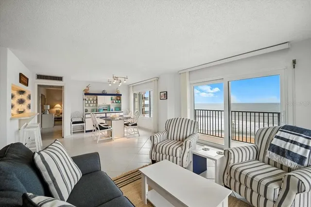 a kitchen with a refrigerator and a sink