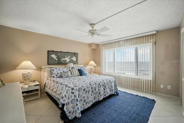 a bathroom with a sink toilet a mirror and shower