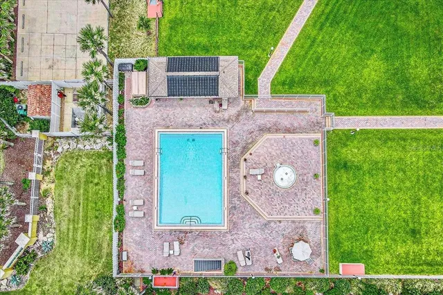 front view of a house with a garden