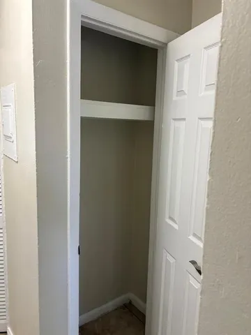 a bathroom with a shower and a toilet