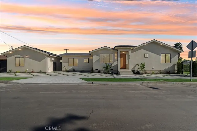 front view of a house with a street