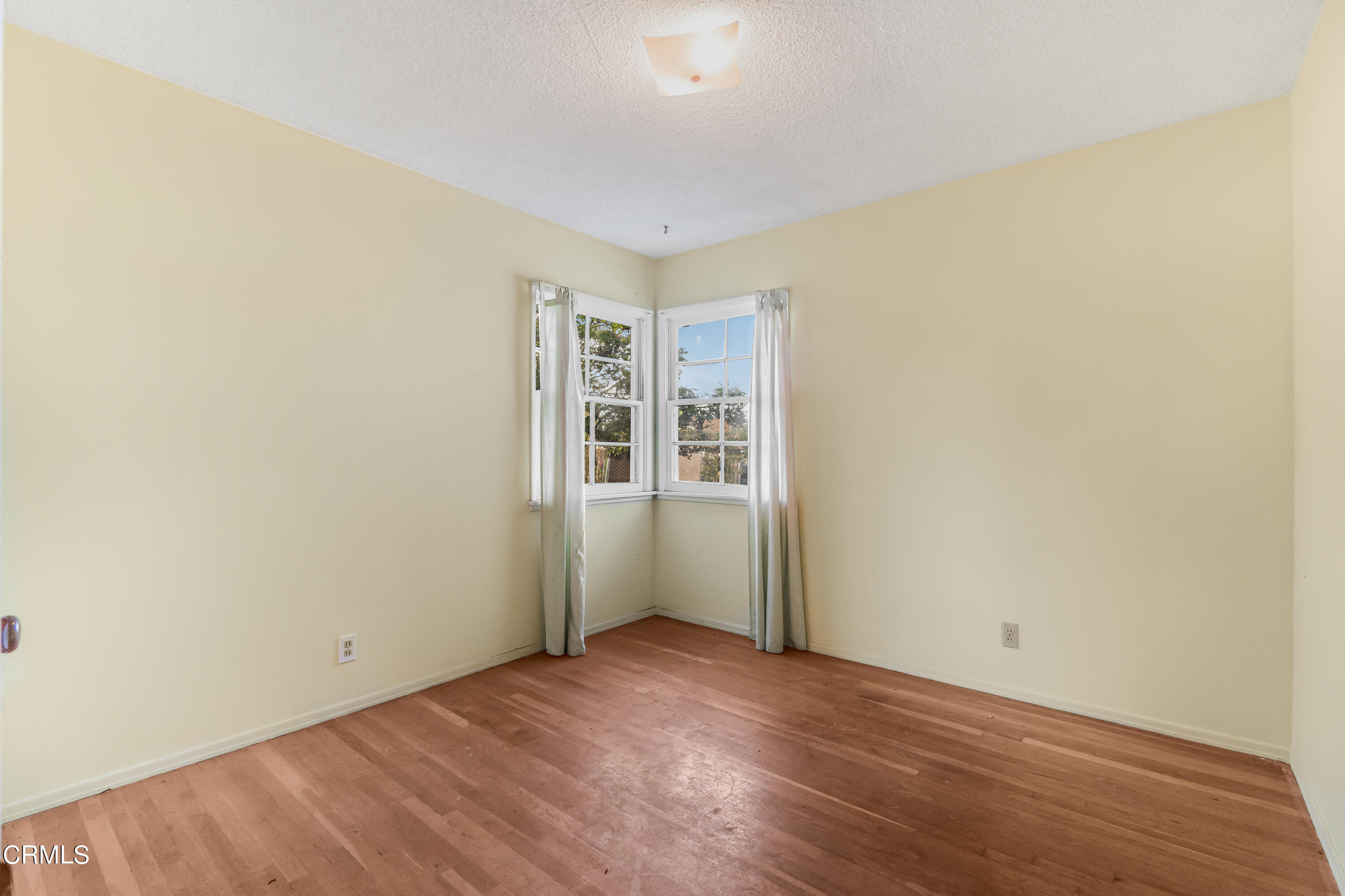 3619 A Court Oxnard, CA 93033 - Photo 14 of 23 a view of an empty room with wooden floor