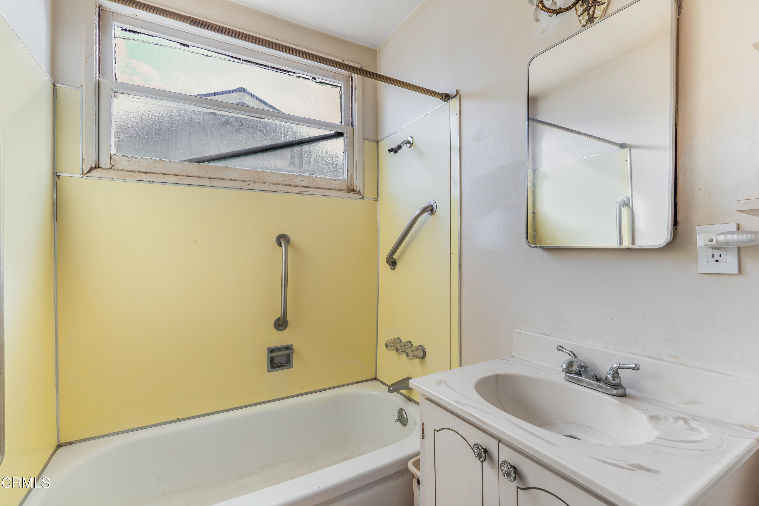 3619 A Court Oxnard, CA 93033 - Photo 15 of 23 a bathroom with a tub a sink and mirror