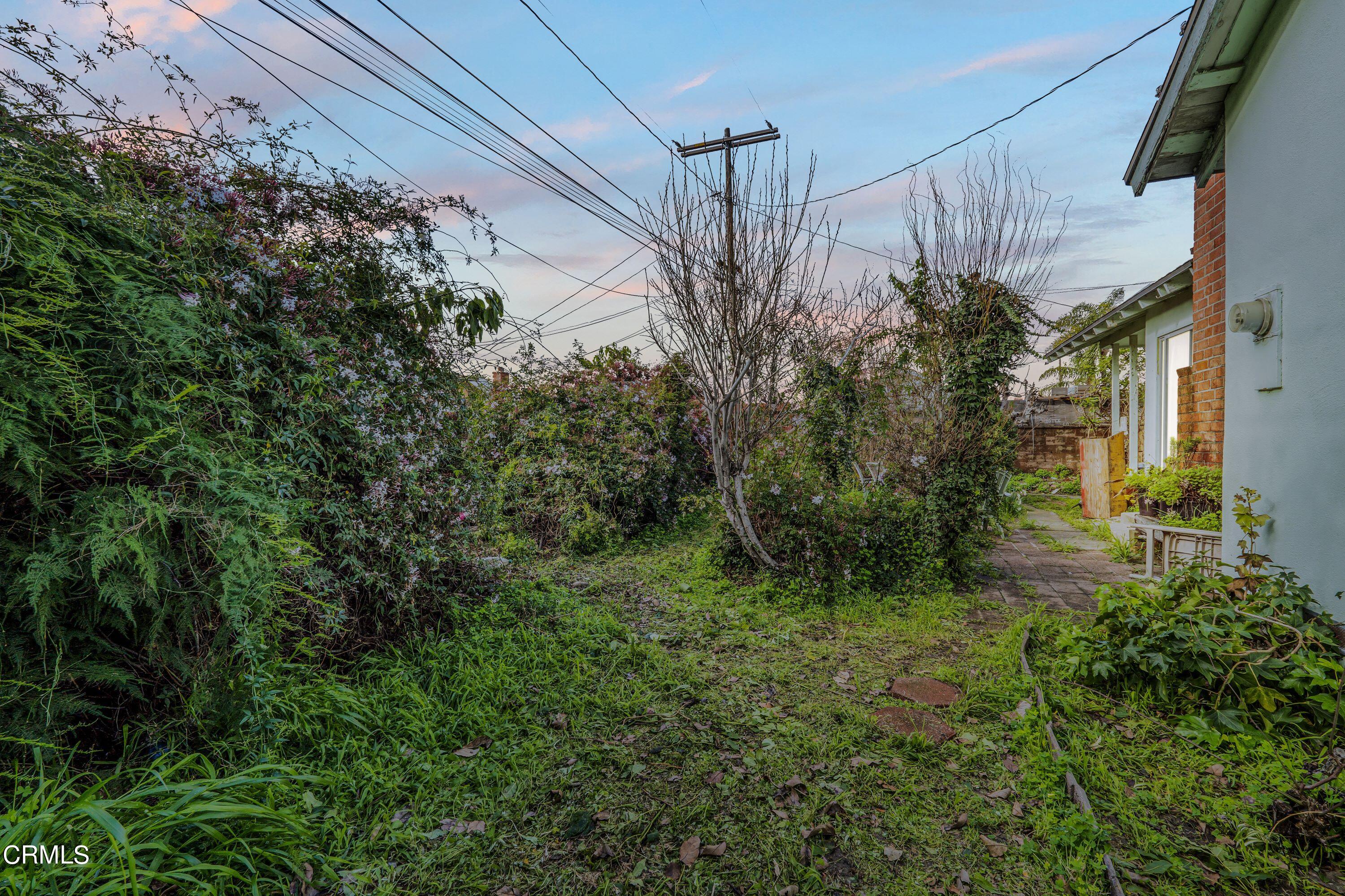 3619 A Court Oxnard, CA 93033 - Photo 18 of 23 a view of a yard front of house