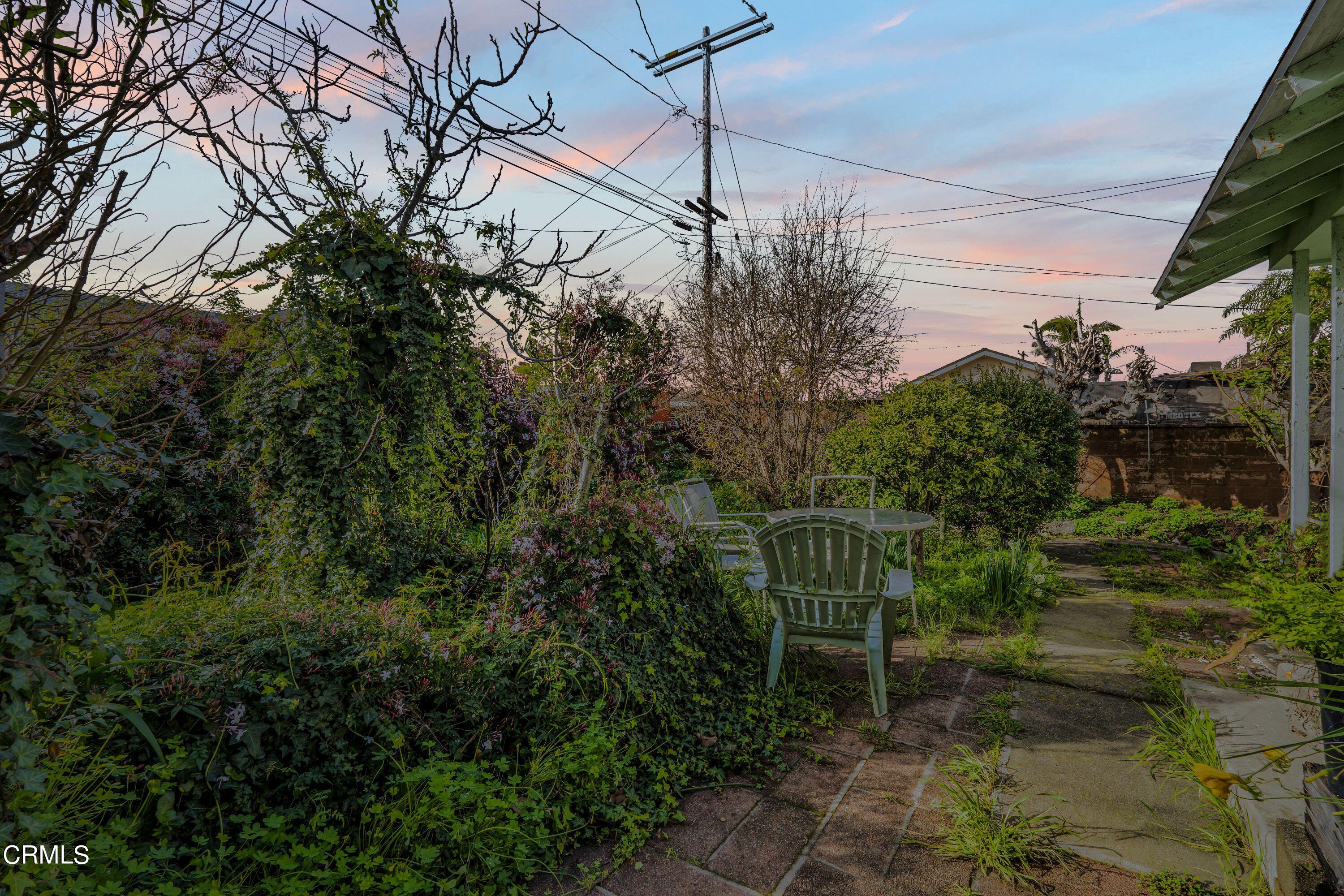 3619 A Court Oxnard, CA 93033 - Photo 19 of 23 a view of a chair and table in the backyard