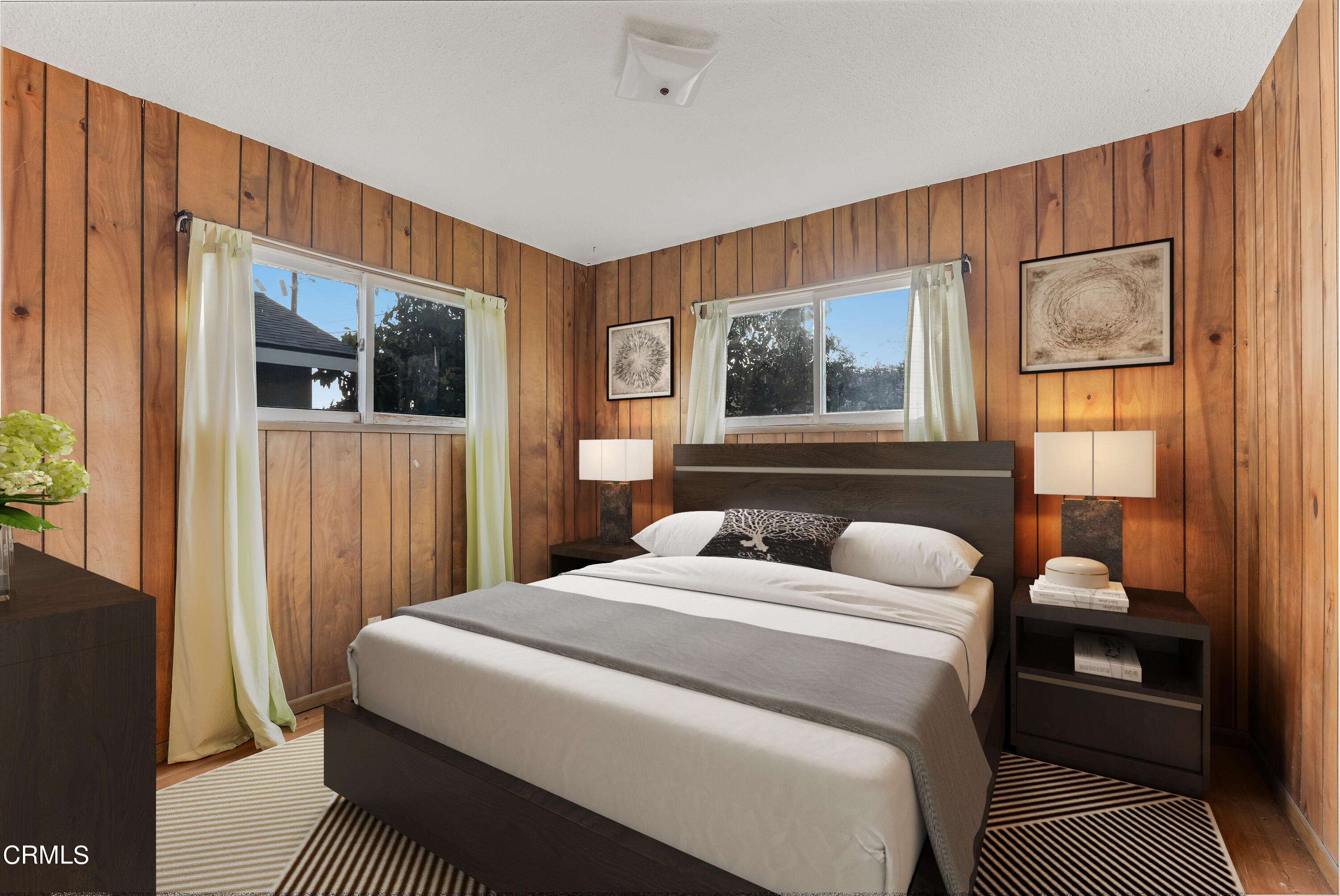 3619 A Court Oxnard, CA 93033 - Photo 10 of 23 a bedroom with a bed and a flat screen tv