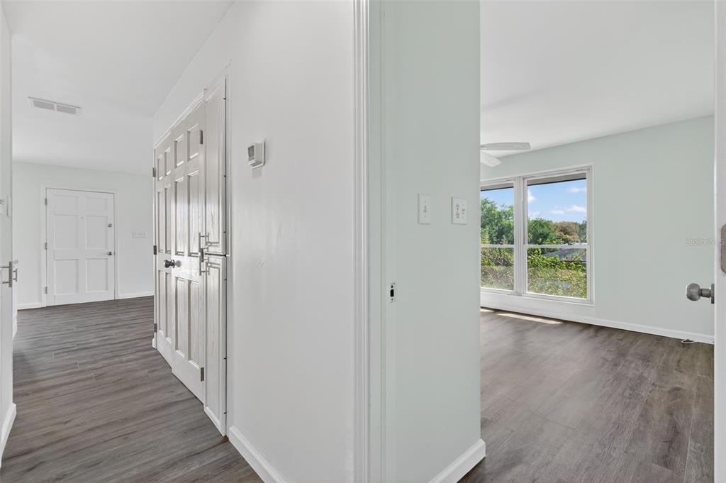 1935 South Conway Road, Unit F6 Orlando, FL 32812 - Photo 11 of 23 a view of a hallway with wooden floor and a window
