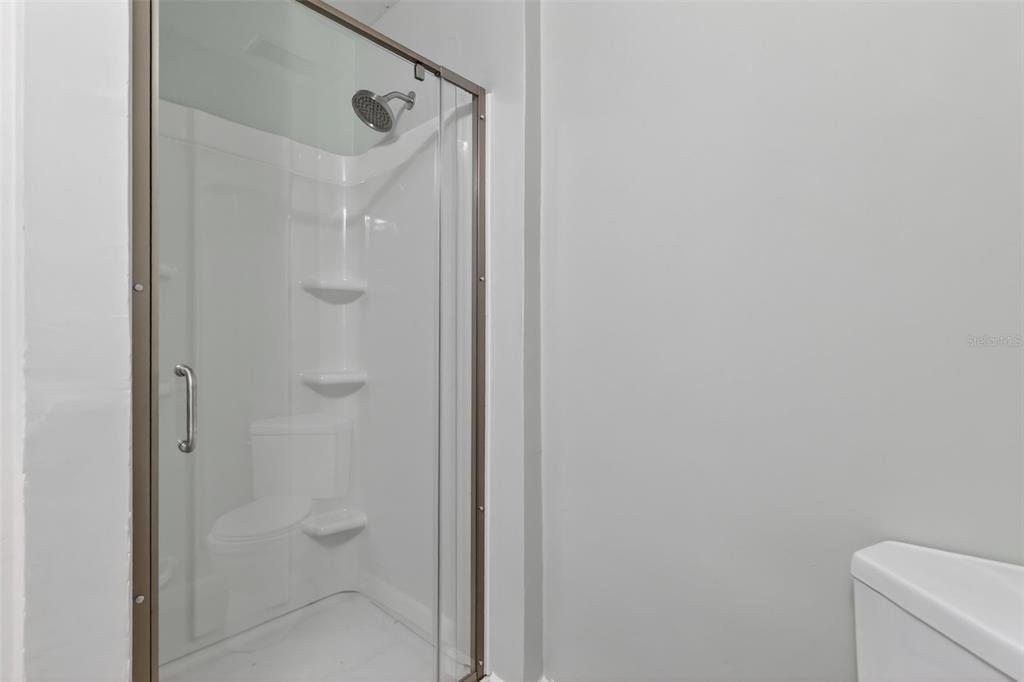 1935 South Conway Road, Unit F6 Orlando, FL 32812 - Photo 19 of 23 a bathroom with a shower