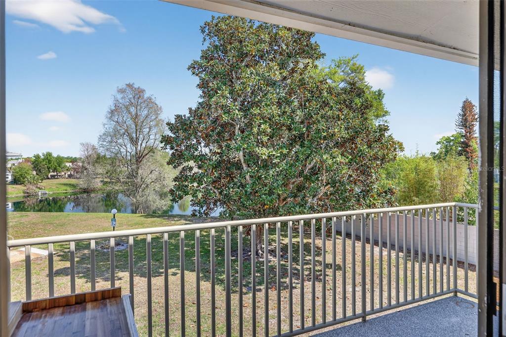 1935 South Conway Road, Unit F6 Orlando, FL 32812 - Photo 2 of 23 a view of a balcony with outdoor space