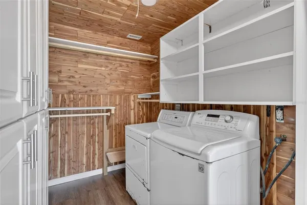 a utility room with dryer and washer