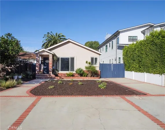 a front view of a house with yard