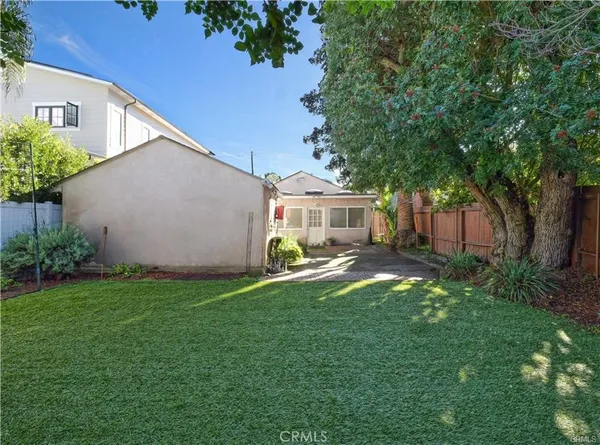 a house view with a garden space