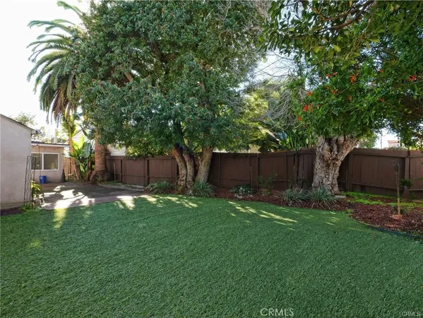 a backyard of a house with seating space