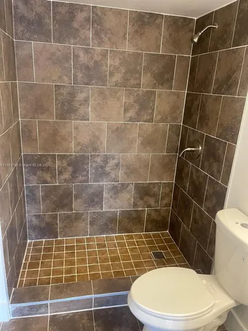 a bathroom with a toilet