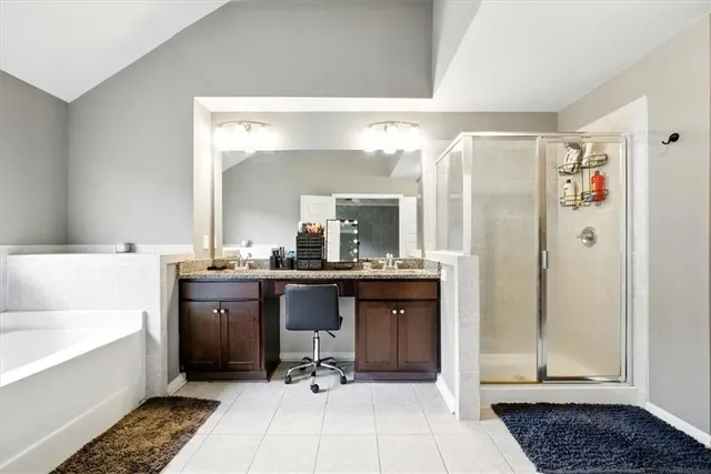 a view of bathroom with dual sinks