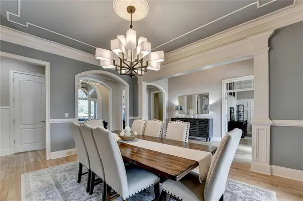 a living room with furniture and a night stand