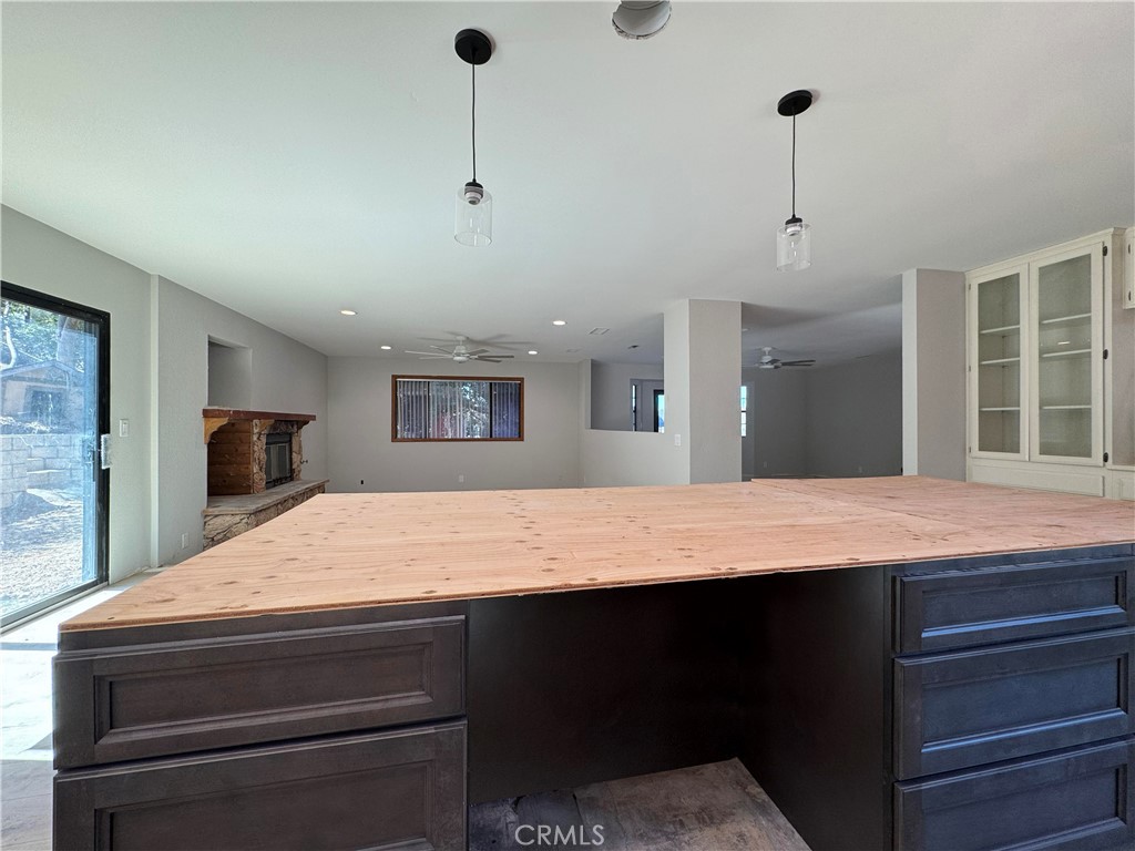 13643 Melissa Lane Poway, CA 92064 - Photo 7 of 9 kitchen open to dining/family/media space