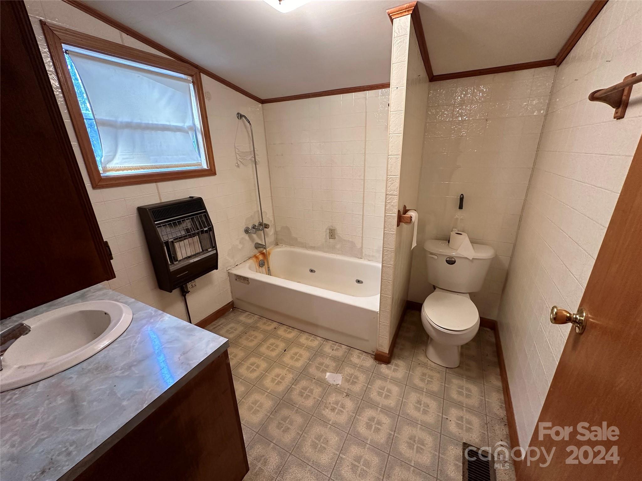 11298 Highway 265 Jefferson, SC 29718 - Photo 19 of 22 a bathroom with a sink toilet and shower