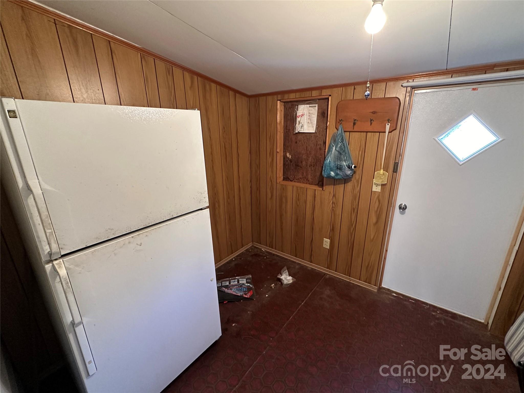 11298 Highway 265 Jefferson, SC 29718 - Photo 20 of 22 a white refrigerator freezer sitting inside of a kitchen