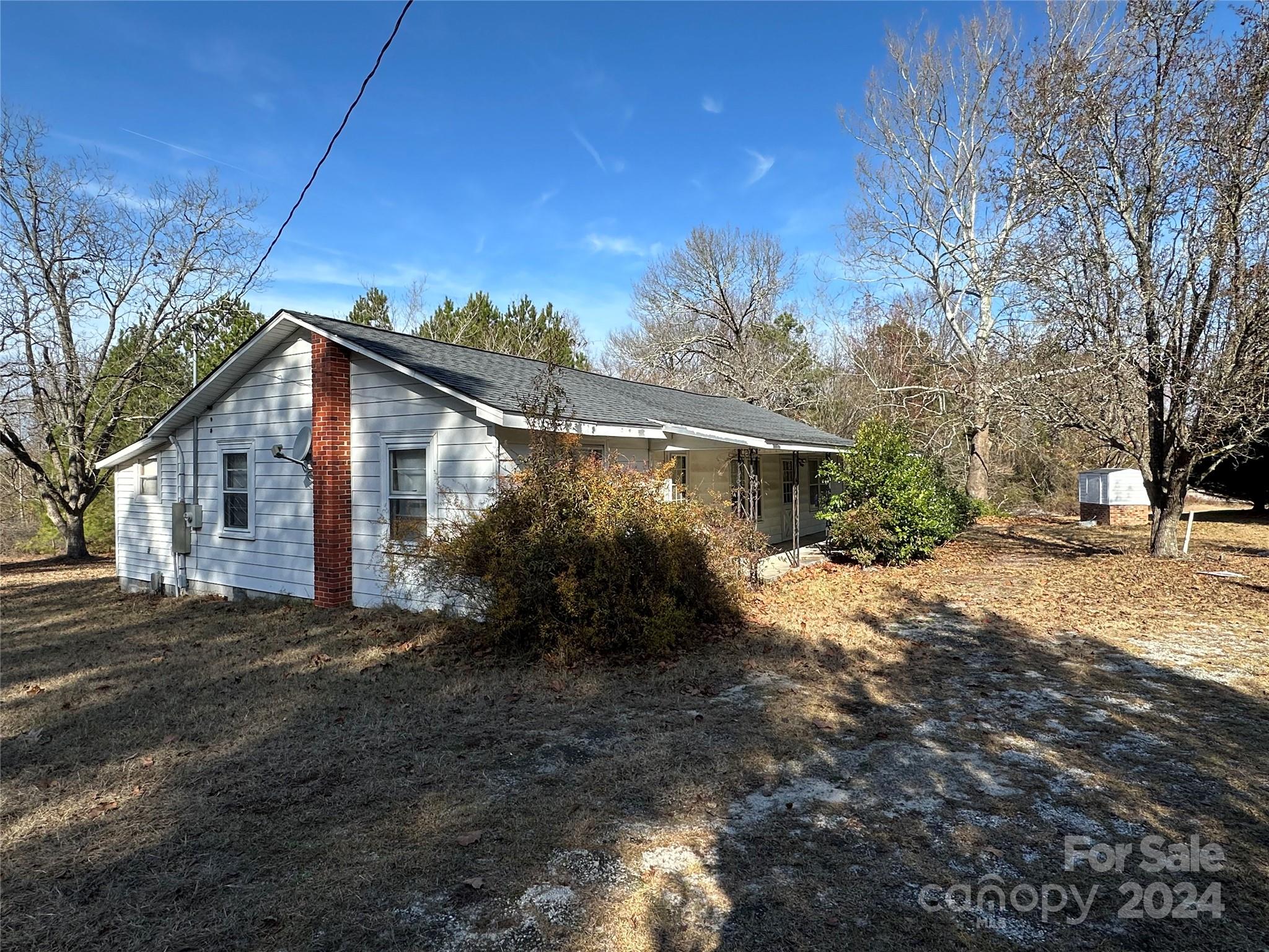 11298 Highway 265 Jefferson, SC 29718 - Photo 2 of 22 a view of a house with a yard