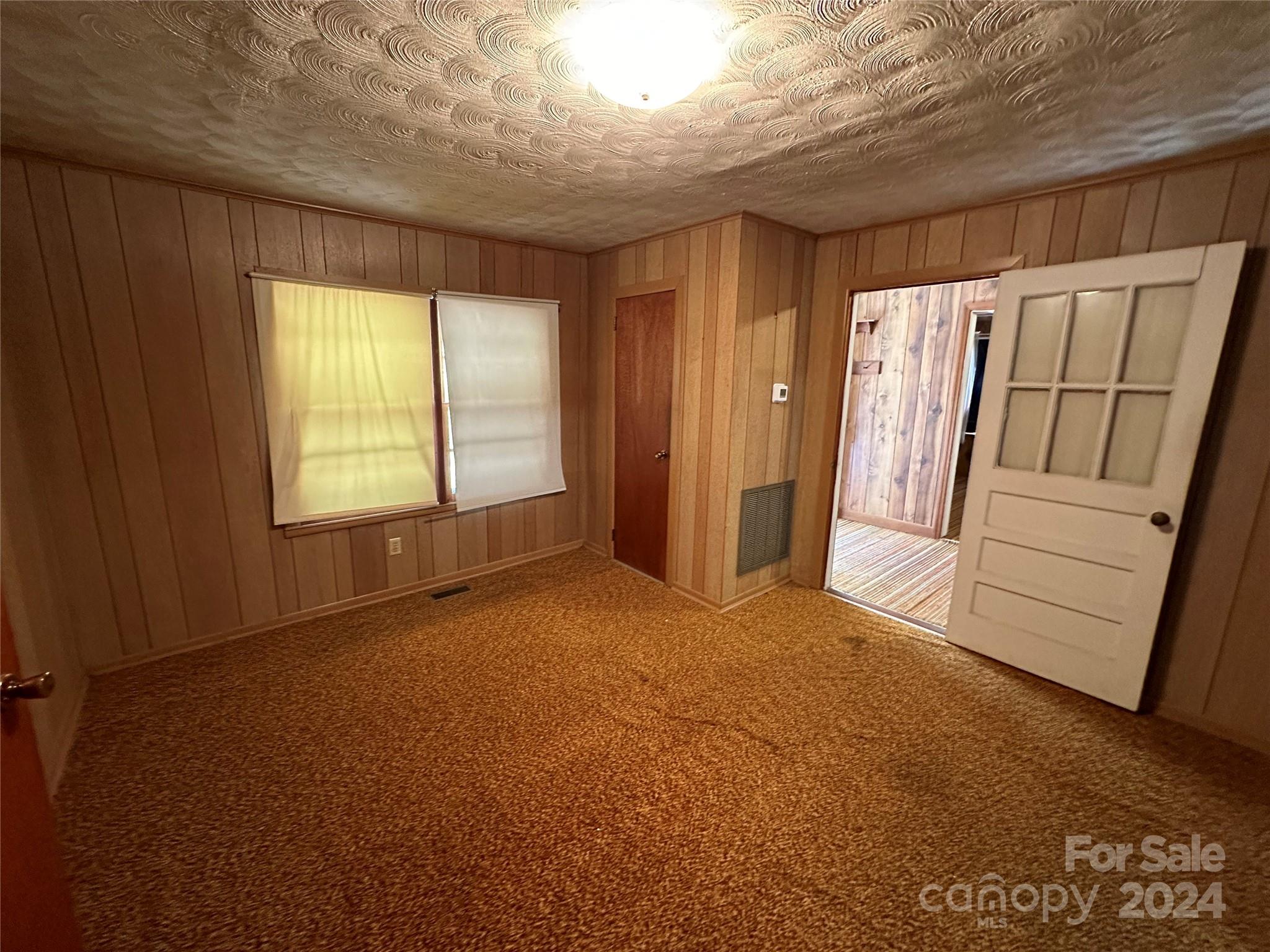 11298 Highway 265 Jefferson, SC 29718 - Photo 22 of 22 a view of an empty room with a window