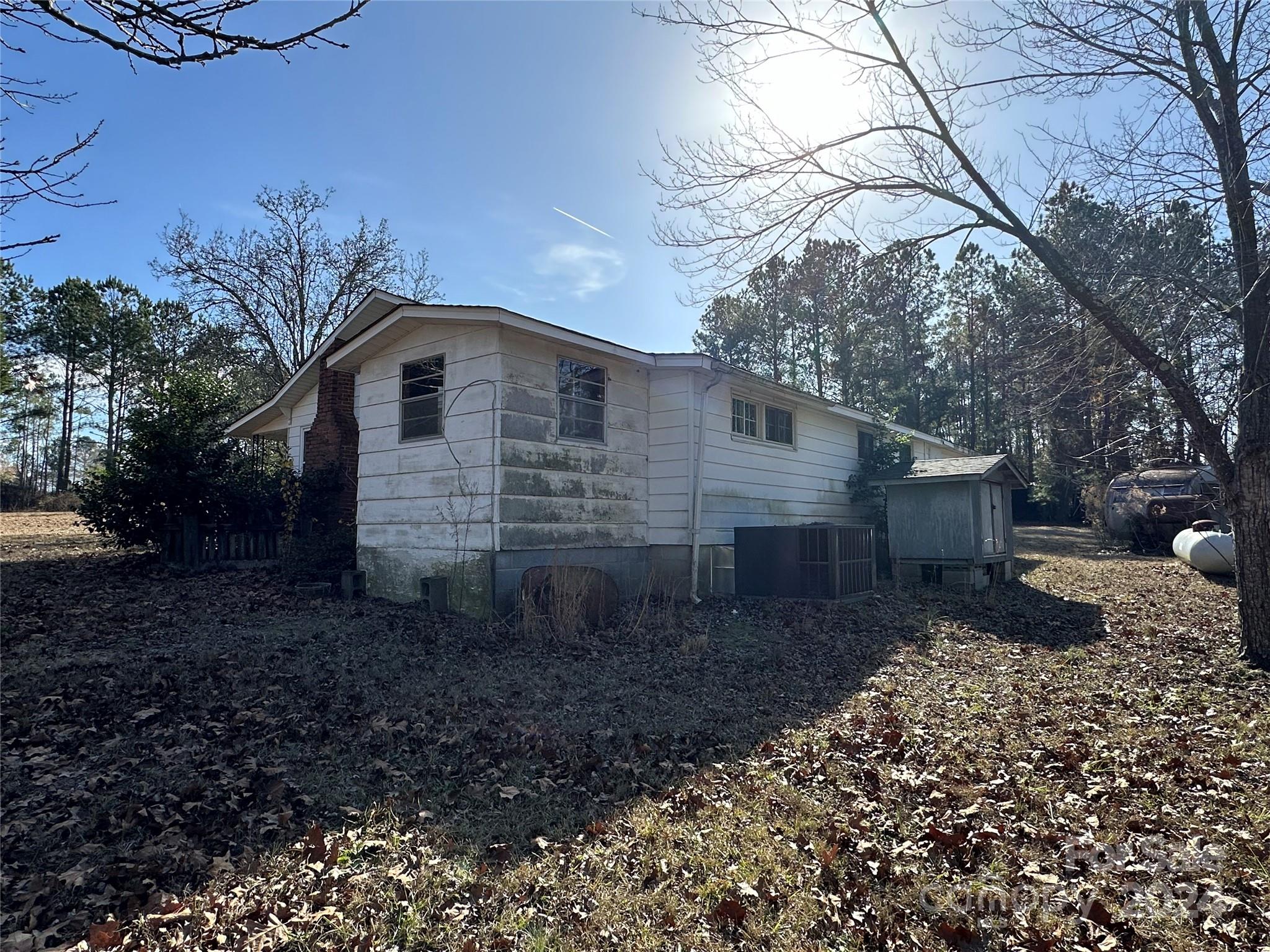11298 Highway 265 Jefferson, SC 29718 - Photo 3 of 22 a front view of a house with a yard