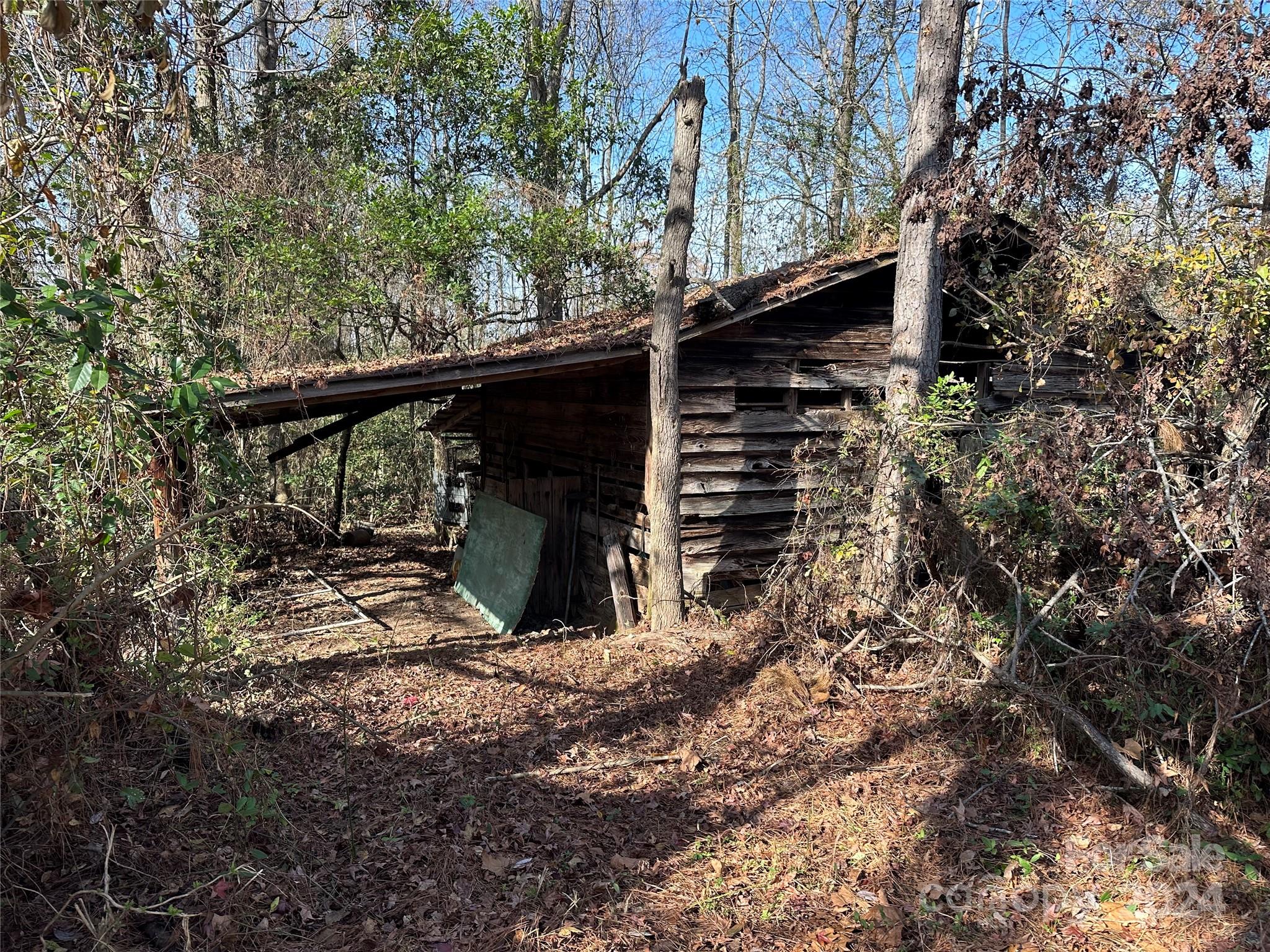 11298 Highway 265 Jefferson, SC 29718 - Photo 6 of 22 a view of house with a tree in the background