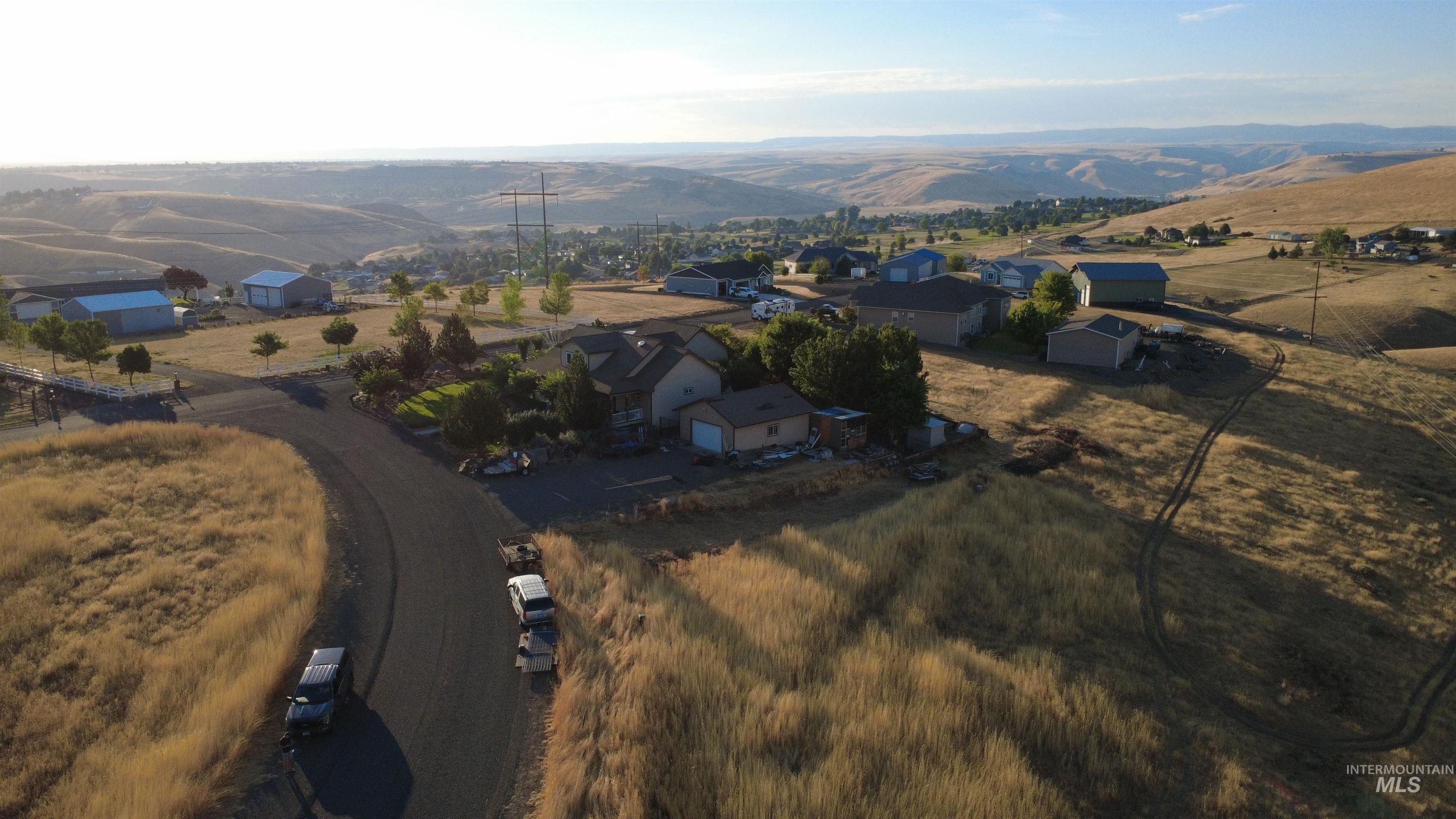 2606 Dove Road Clarkston, WA 99403 - Photo 4 of 9 Drone / aerial view of a mountain backdrop