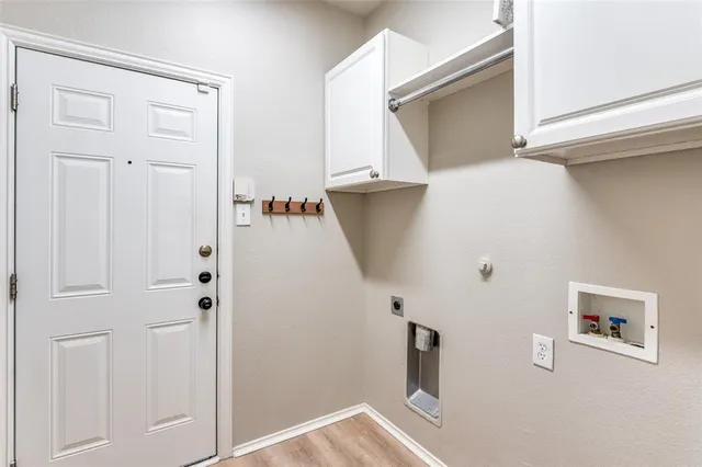 a view of a hallway with closet