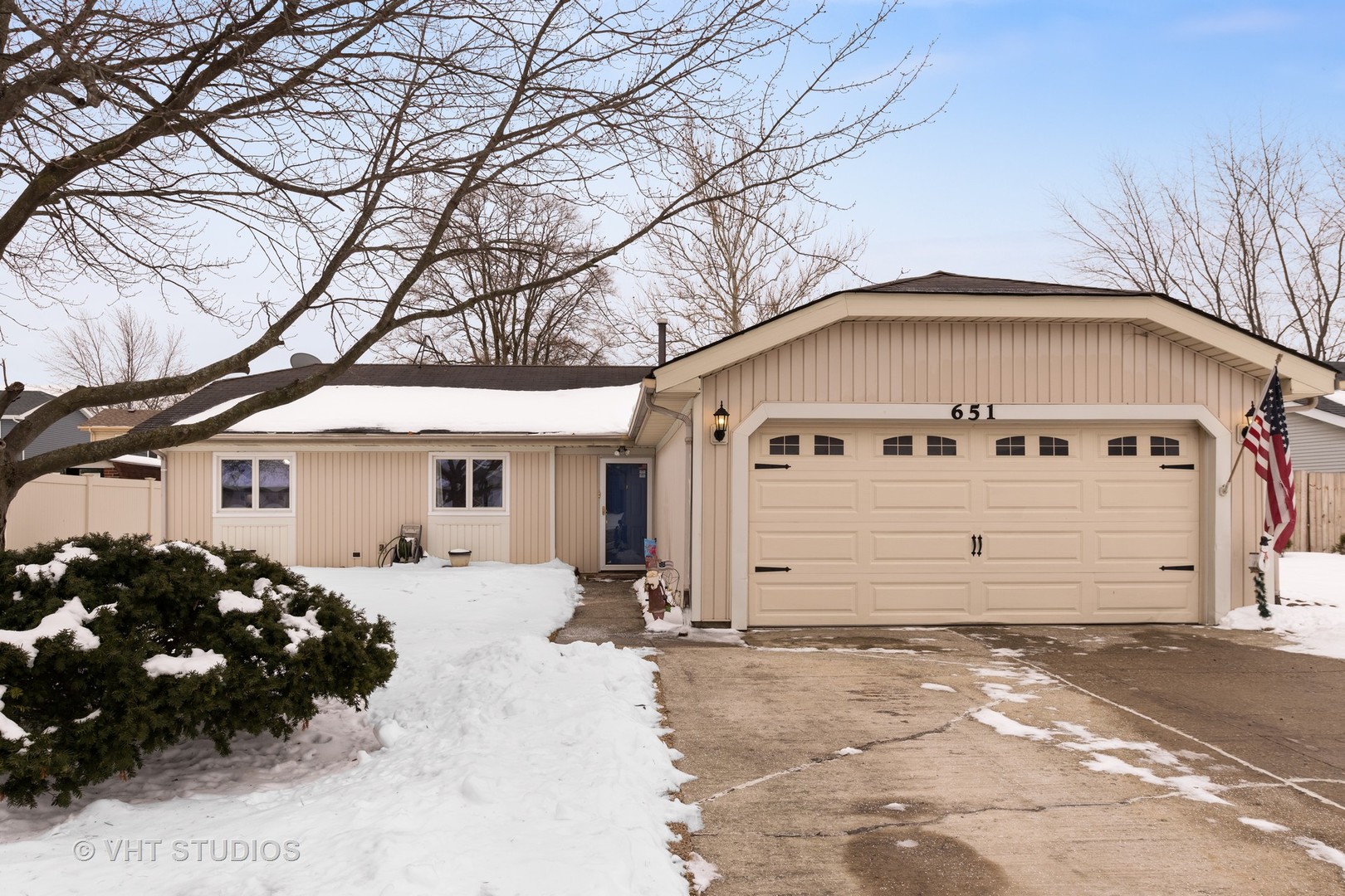 651 Rockhurst Road Bolingbrook, IL 60440 - Photo 2 of 15 a front view of a house with a yard