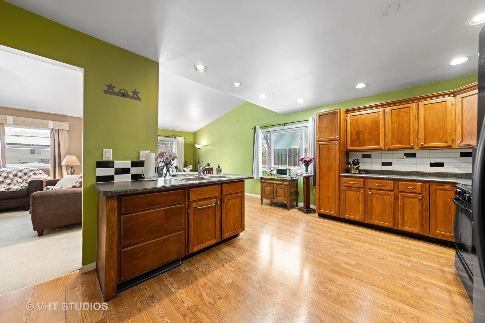 651 Rockhurst Road Bolingbrook, IL 60440 - Photo 4 of 15 a kitchen with stainless steel appliances granite countertop a stove a sink and a refrigerator