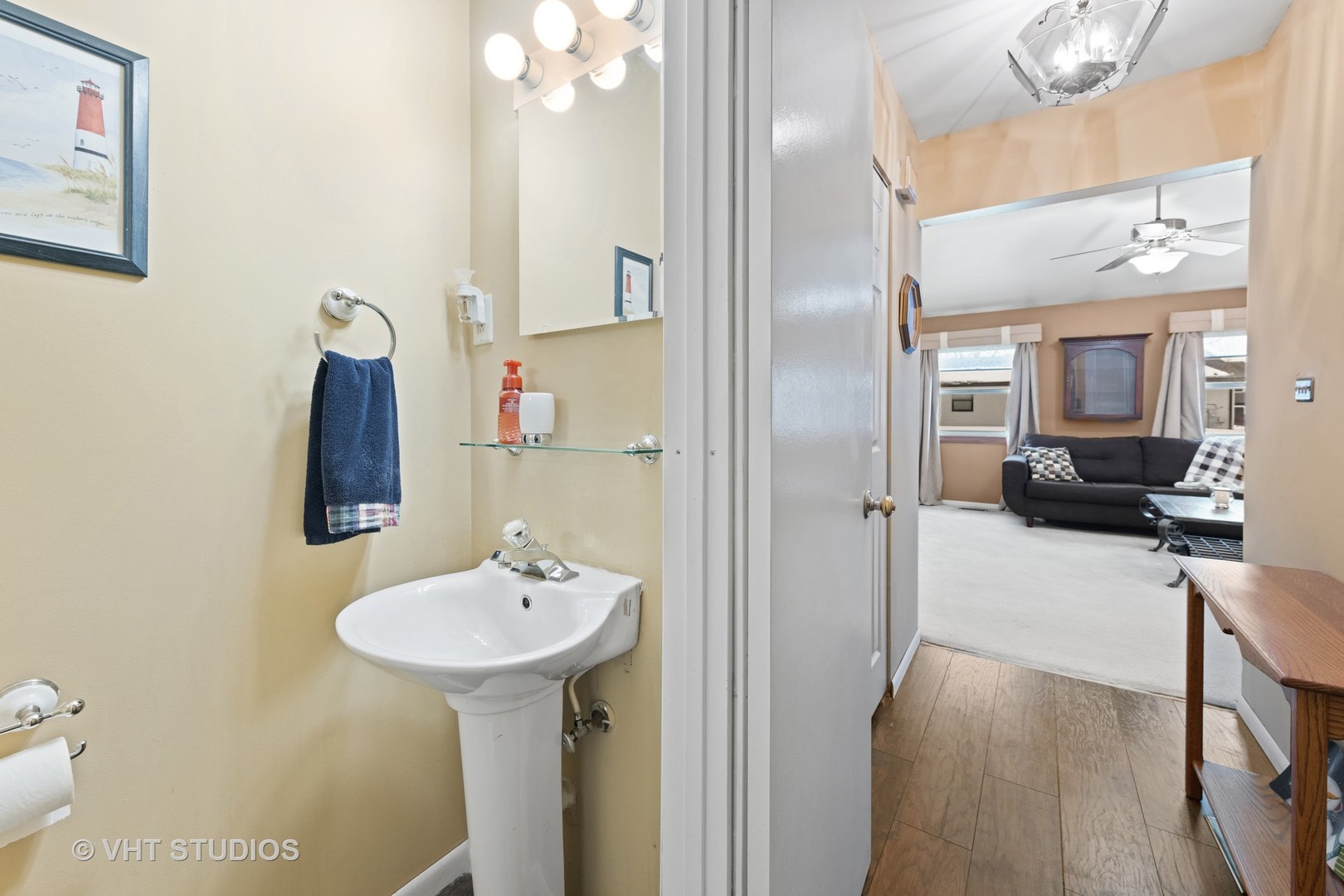 651 Rockhurst Road Bolingbrook, IL 60440 - Photo 8 of 15 a en suite bathroom with a sink and a mirror