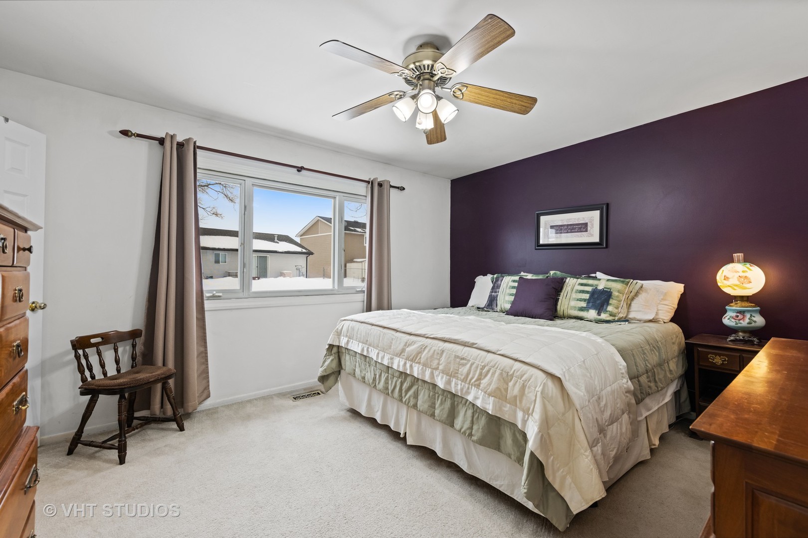 651 Rockhurst Road Bolingbrook, IL 60440 - Photo 9 of 15 a bedroom with a bed and a chandelier